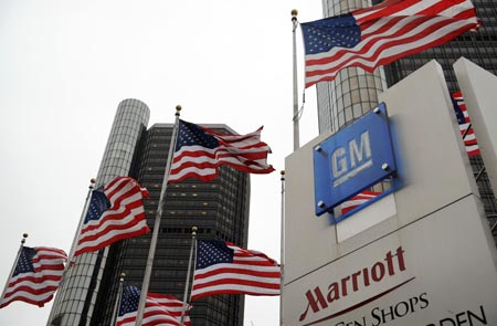 The logo of General Motors Corp. (GM) is seen in front of the GM headquarters in Detroit, the United States, April 15, 2009. The largest U.S. automaker, General Motors Corp., officially filed for bankruptcy protection at 8 a.m. EDT (1200 GMT) on Monday, the largest bankruptcy protection case in the U.S. industrial history. (Xinhua/Gu Xinrong) 