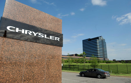 The U.S. Supreme Court decided Monday to temporarily delay Chrysler's sale to Italian automaker Fiat.