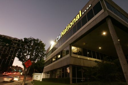 A California National Bank branch is shown in downtown Los Angeles October 30, 2009. Regulators are expected to seize Los Angeles-based California National Bank on Friday in what would be the fourth-largest U.S. bank failure this year, the Los Angeles Times reported, citing unnamed sources.