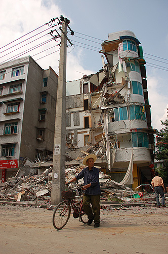 A collapsed building at the Xingfu Xiaoqu residential complex in Dujiangyan